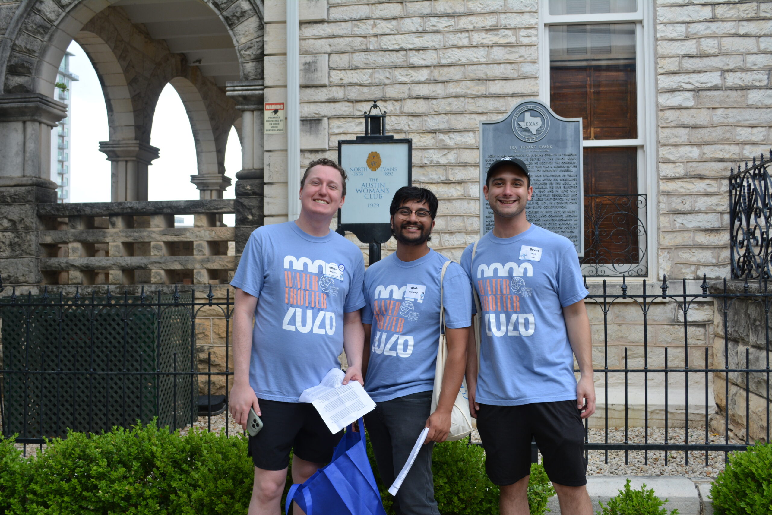 Water Trotter participants taking a picture in front of an Austin landmark