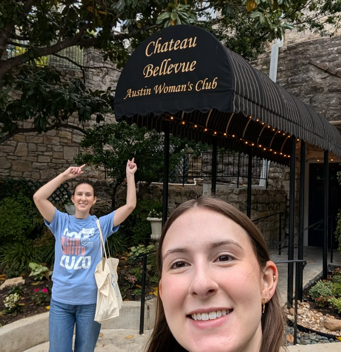 Water Trotter participants taking a picture in front of an Austin landmark