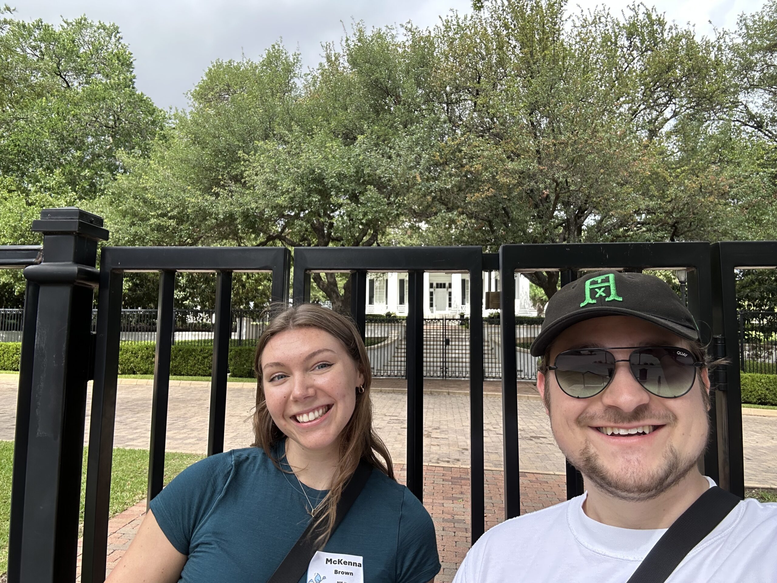 Water Trotter participants taking a picture in front of an Austin landmark